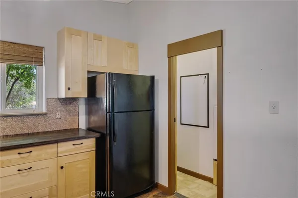 a view of storage and utility room with washer and dryer