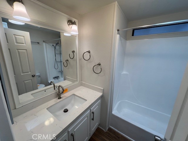 33056 Garner Road Lake Elsinore, CA 92530 - Photo 17 of 50 a bathroom with a sink a tub and a mirror