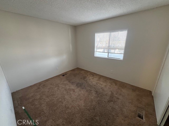 33056 Garner Road Lake Elsinore, CA 92530 - Photo 19 of 50 an empty room with a window