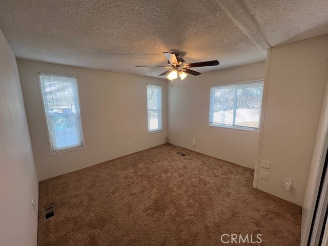 33056 Garner Road Lake Elsinore, CA 92530 - Photo 21 of 50 a view of an empty room with a window
