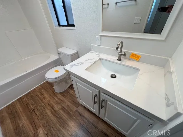 a bathroom with a sink and a toilet
