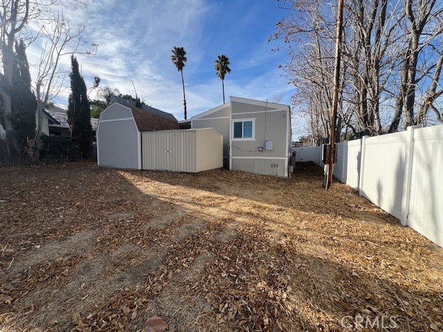 33056 Garner Road Lake Elsinore, CA 92530 - Photo 28 of 50 a view of a house with a yard