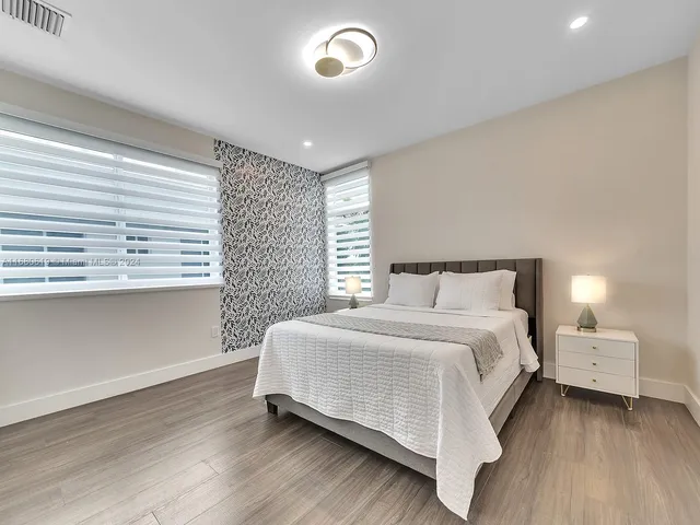 a chair and table in a balcony