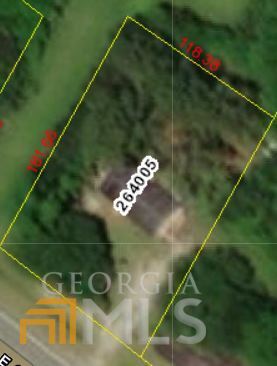 13250 East Oglethorpe Highway Midway, GA 31320 - Photo 12 of 12 a bathroom with a shower and a mirror