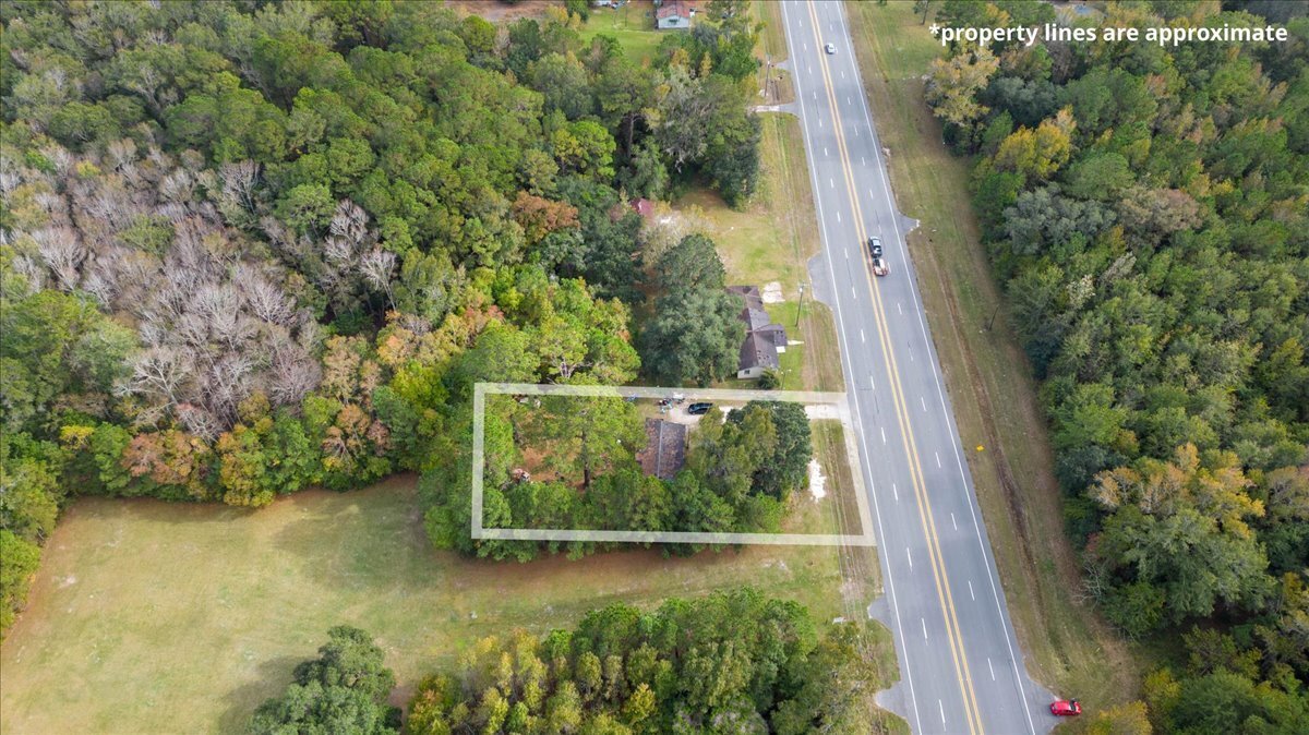13250 East Oglethorpe Highway Midway, GA 31320 - Photo 4 of 12 a view of a garden from a window