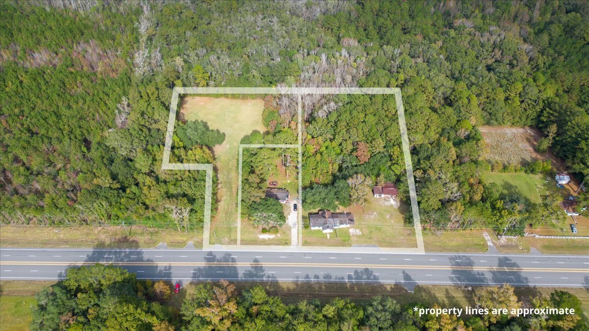 13250 East Oglethorpe Highway Midway, GA 31320 - Photo 7 of 12 front view of a yard