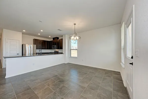 a room with walk in closet and a window