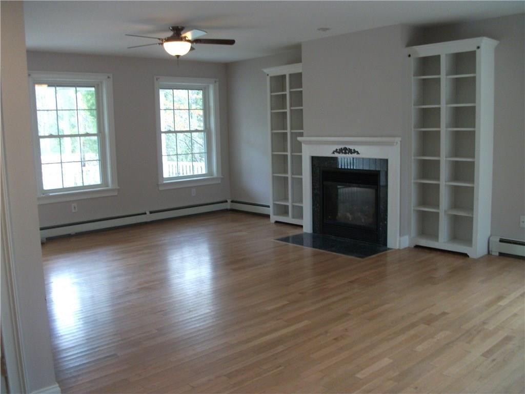 102 Boulder Ridge. Hollis Center, ME 04042 - Photo 7 of 29 Living room with hardwood floor and...