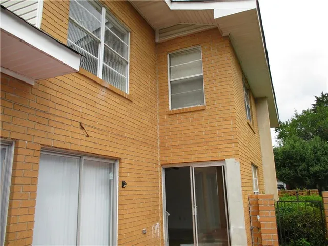 a view of a porch with a yard