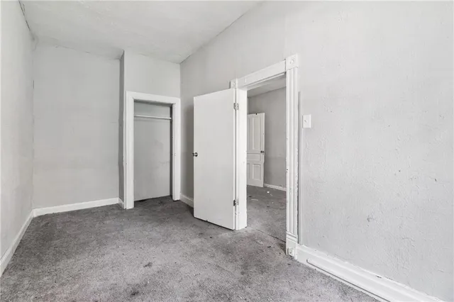 an empty room with closet