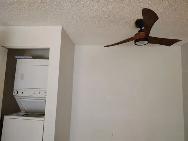 a bathroom with a toilet and a vanity