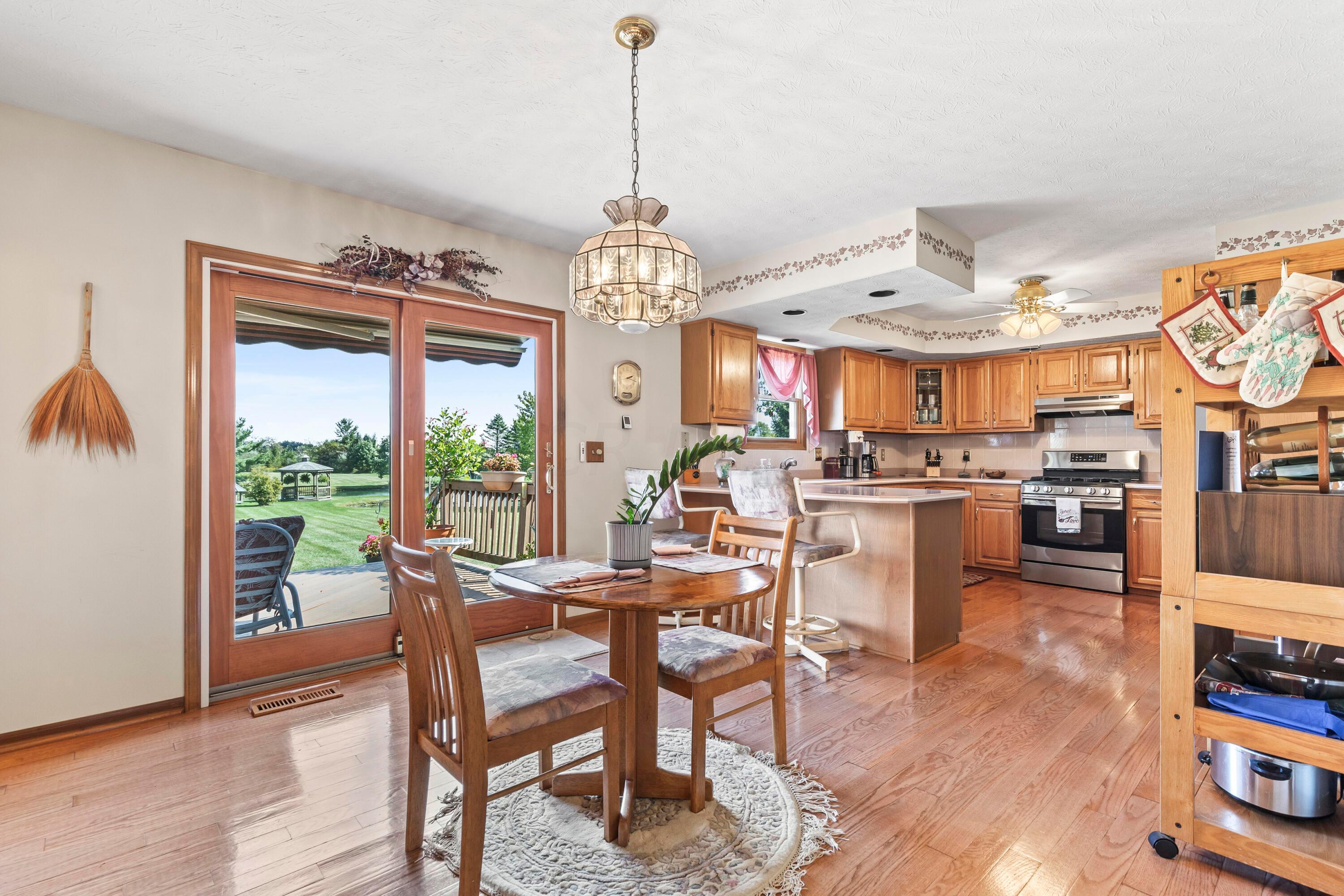 4947 Summit Road Southwest Pataskala, OH 43062 - Photo 12 of 38 DINING ROOM AREA & KITCHEN