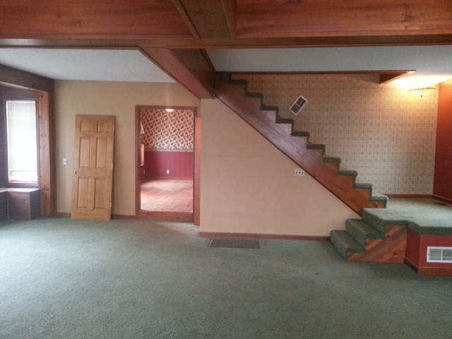 1021 Webster Street Ottawa, IL 61350 - Photo 3 of 11 a view of a livingroom with furniture and staircase