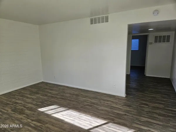 a view of an empty room and window
