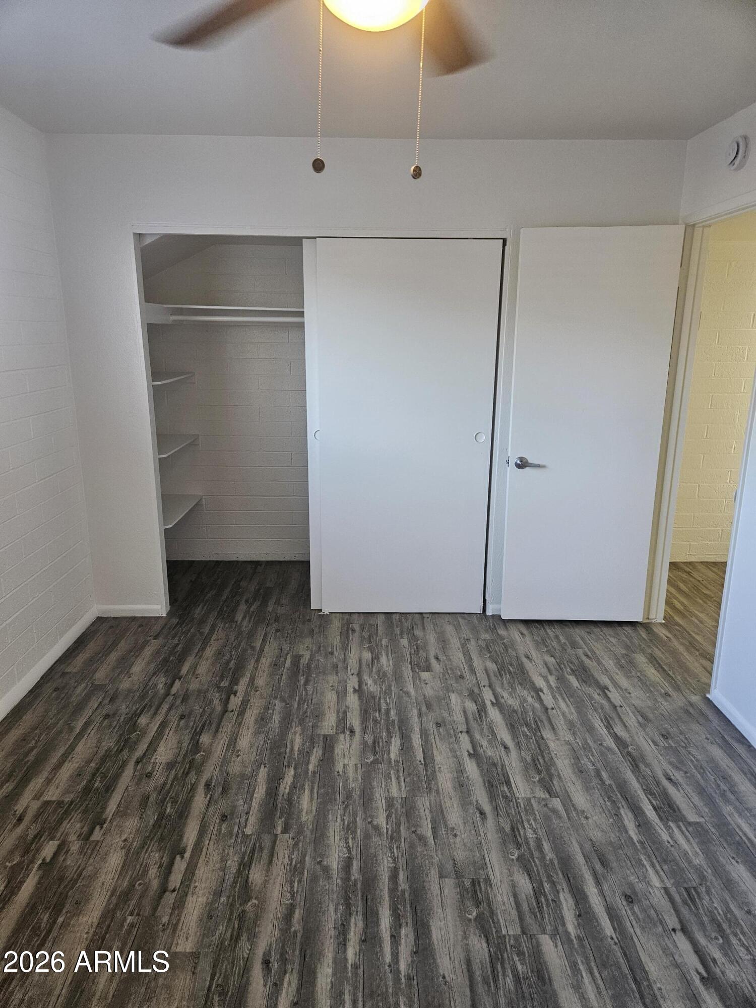 1418 East Osborn Road, Unit 25A Phoenix, AZ 85014 - Photo 9 of 13 a view of wooden floor