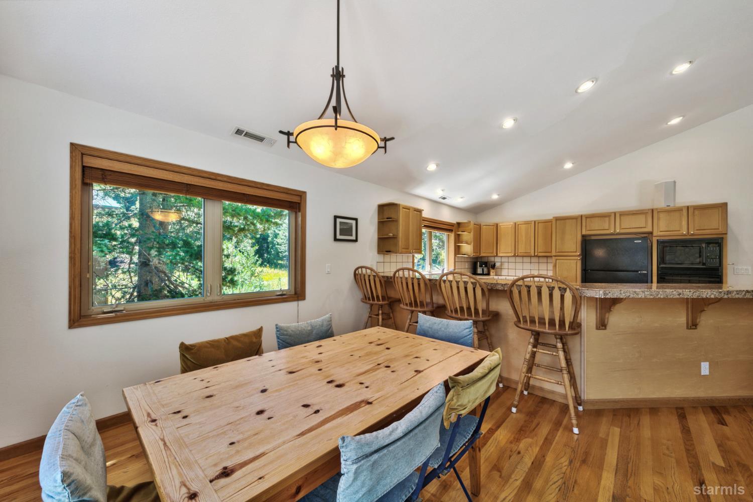 34235 Fremont Road Kirkwood, CA 95646 - Photo 11 of 31 a view of a dining room with furniture window and wooden floor