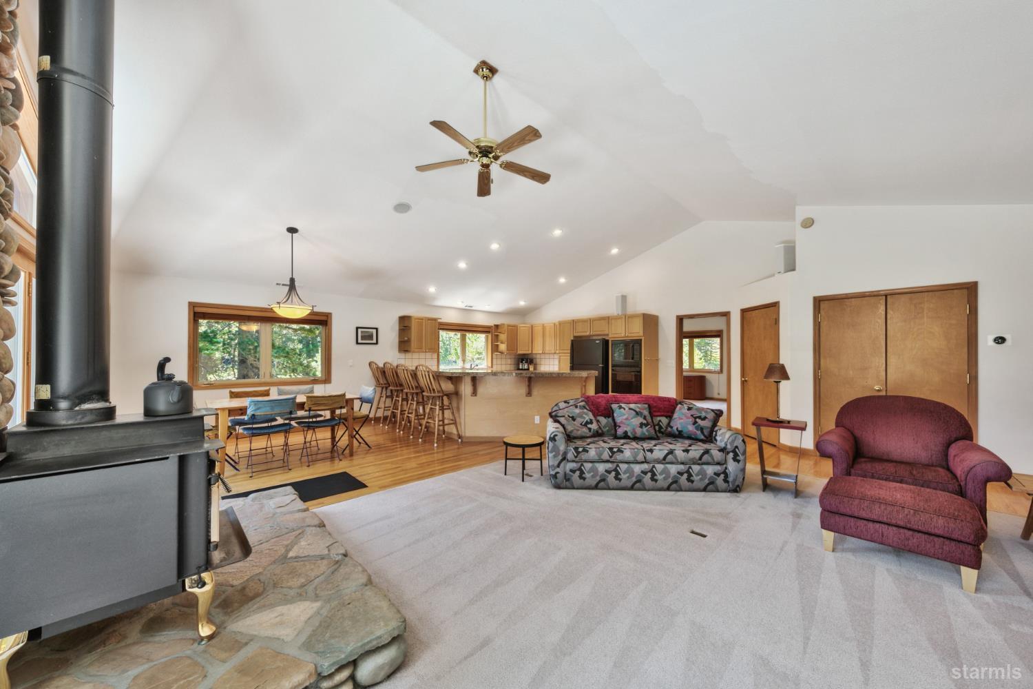34235 Fremont Road Kirkwood, CA 95646 - Photo 9 of 31 a living room with furniture ceiling fan and a window