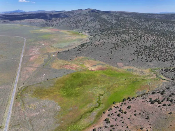 a view of a lake with a mountain