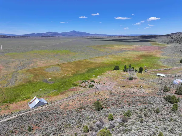 a view of an ocean and city