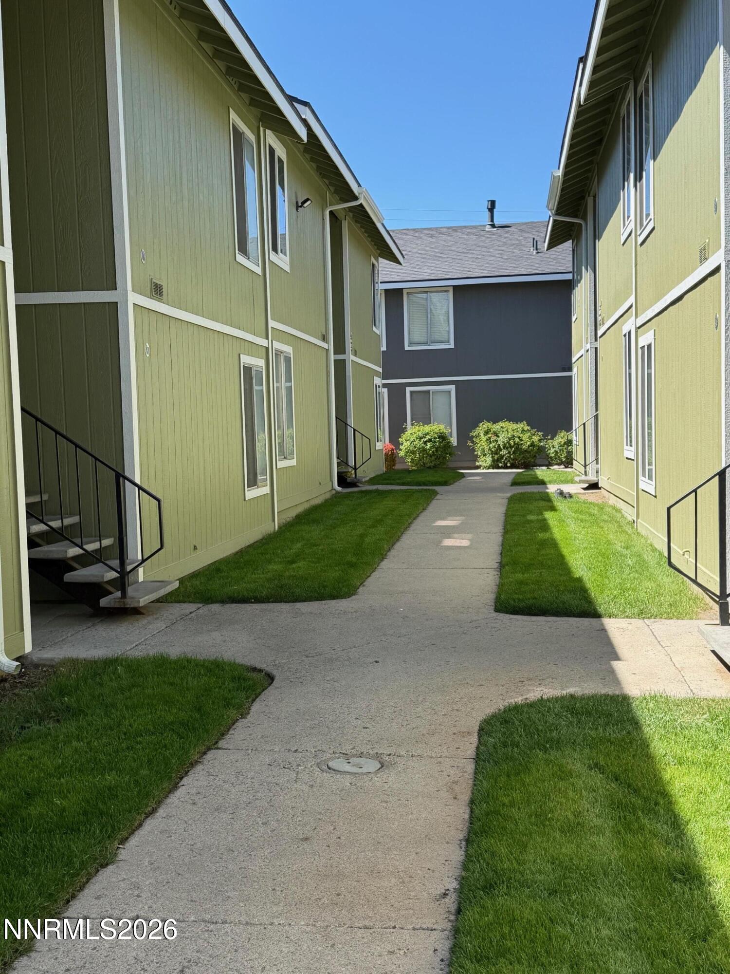 4608 Neil Road, Unit 215 Reno, NV 89502 - Photo 5 of 17 a view of a back yard of the house