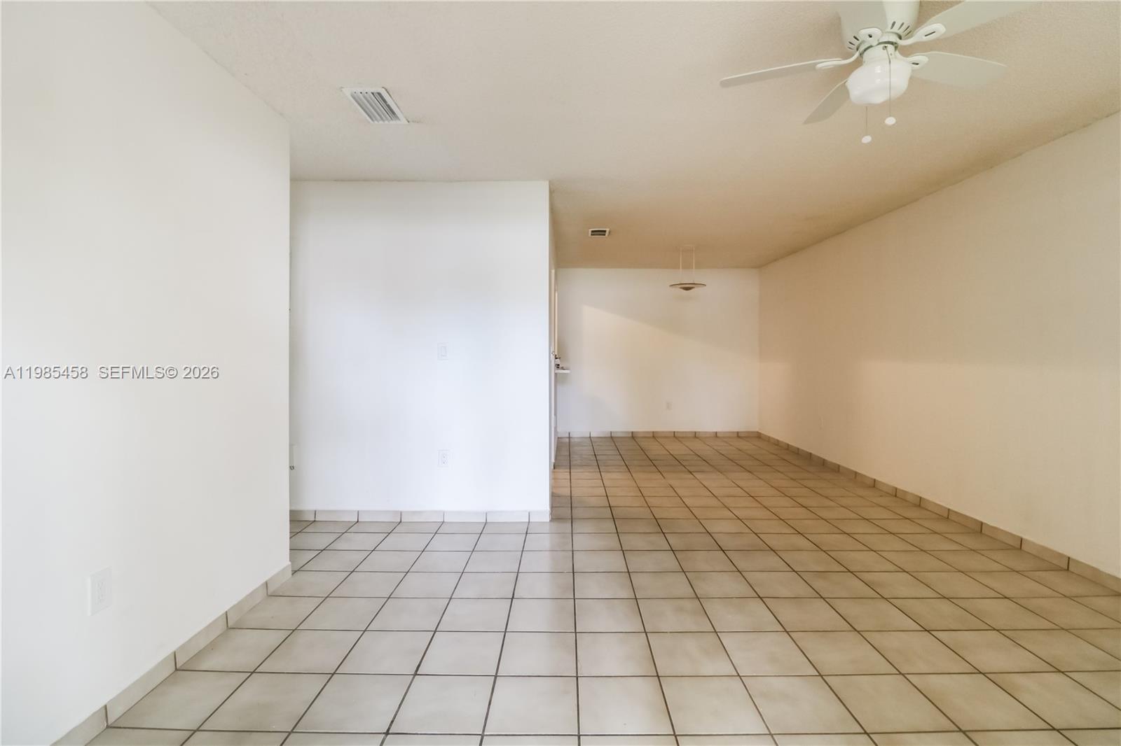 12955 Southwest 66th Lane, Unit 2122 Miami, FL 33183 - Photo 4 of 16 a view of an empty room