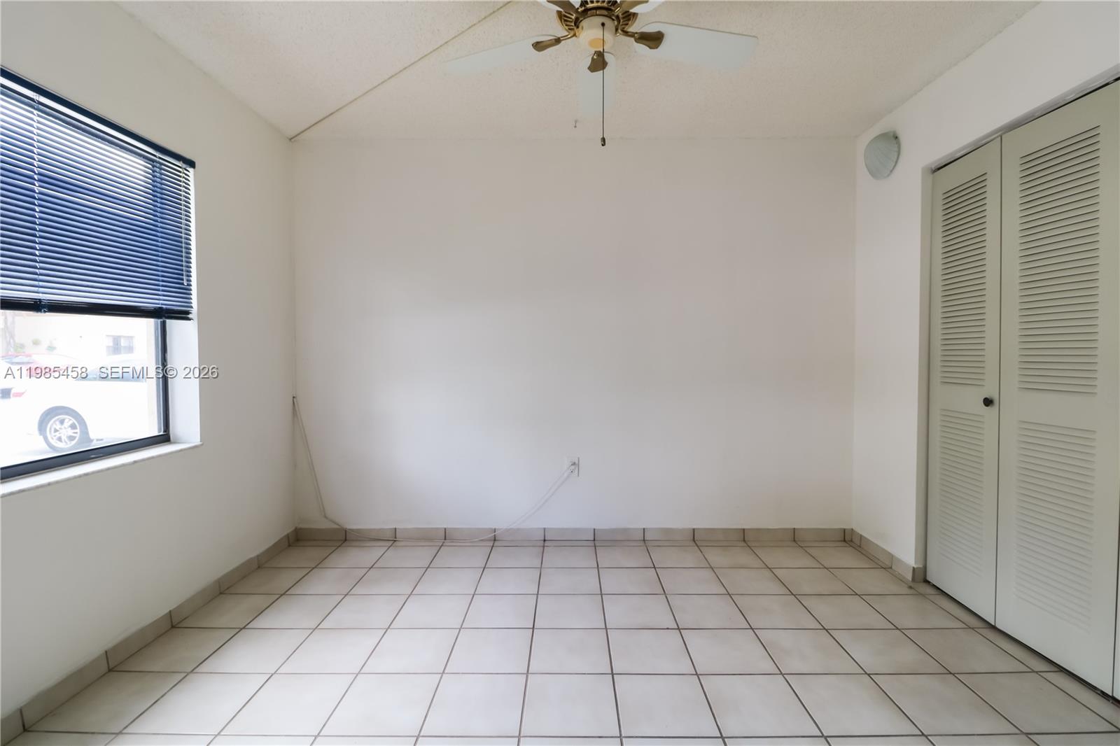 12955 Southwest 66th Lane, Unit 2122 Miami, FL 33183 - Photo 10 of 16 a view of an empty room