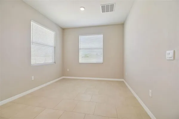 a kitchen with stainless steel appliances kitchen island granite countertop a sink and cabinets