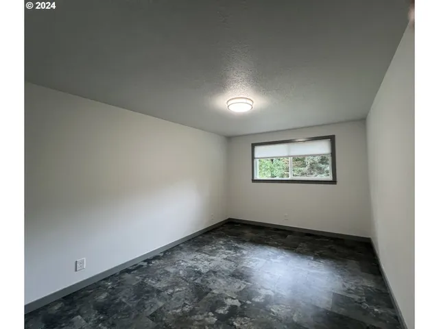 an empty room with a workspace