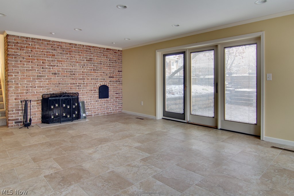 3383 Bancroft Road Akron, OH 44333 - Photo 13 of 33 Family room also leads out to private lower tier patio in back yard.