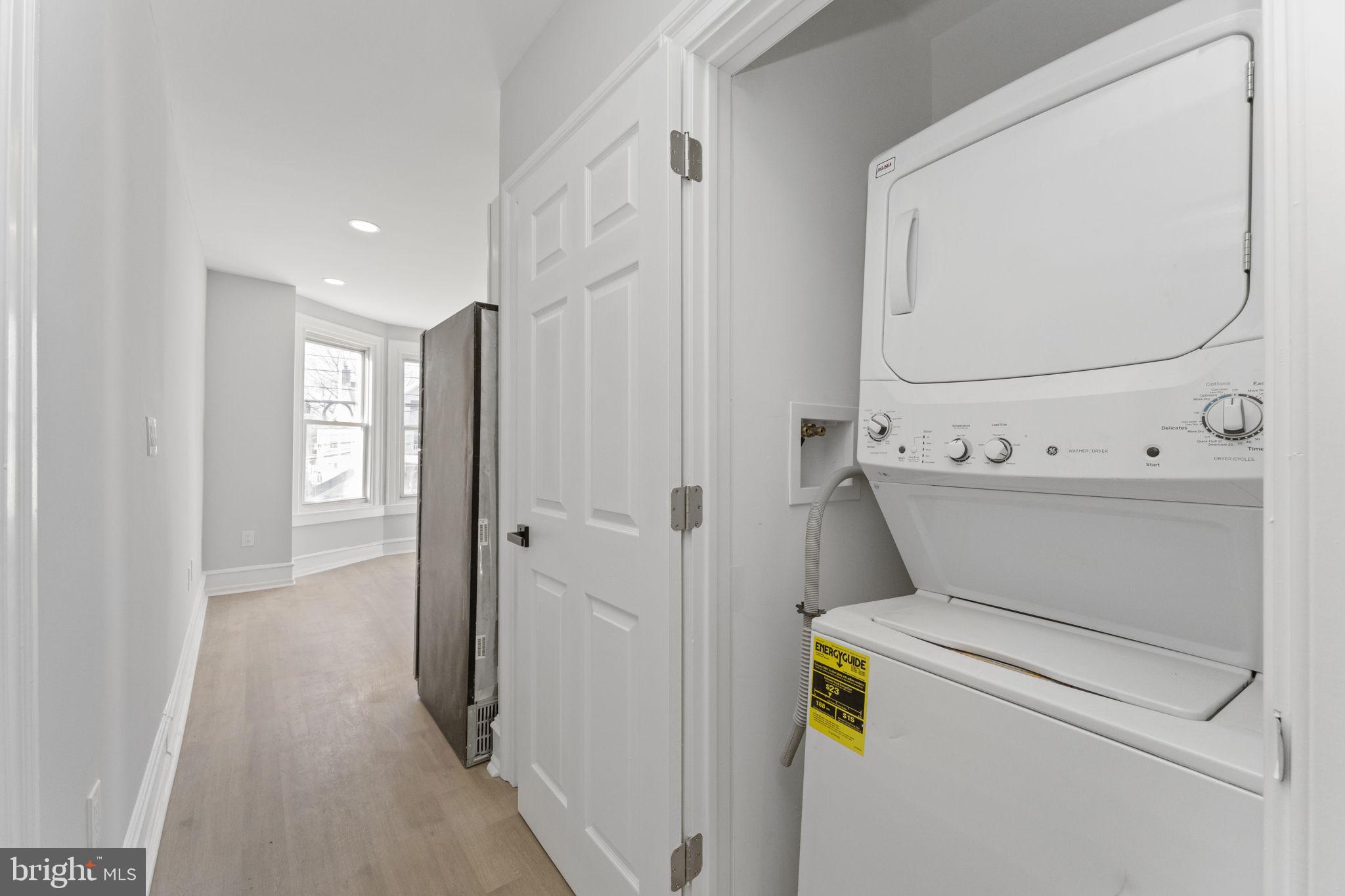 7703 Ridge Avenue Philadelphia, PA 19128 - Photo 14 of 14 a utility room with dryer and washer