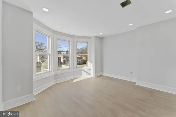 an empty room with windows
