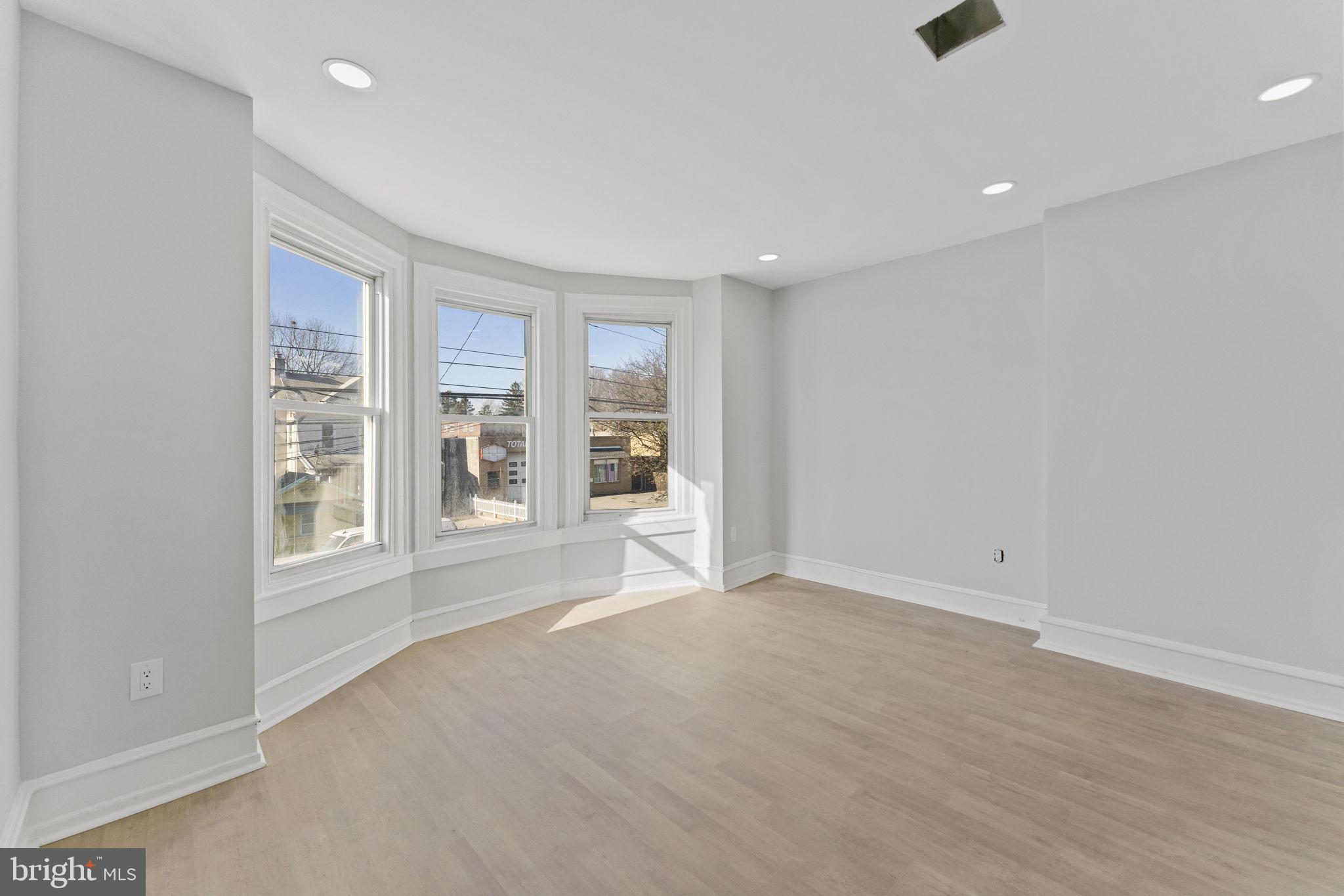 7703 Ridge Avenue Philadelphia, PA 19128 - Photo 2 of 14 an empty room with windows