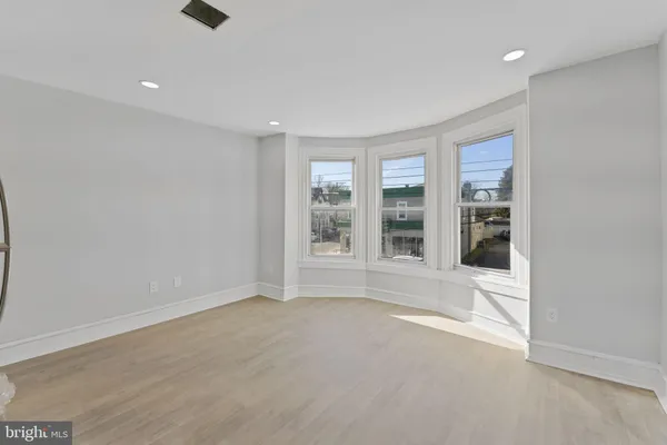 an empty room with windows