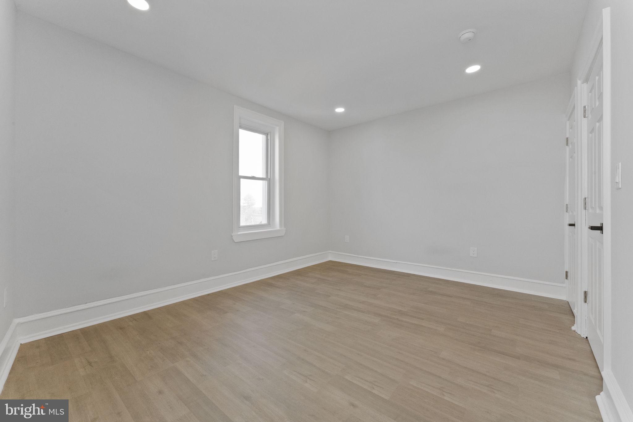 7703 Ridge Avenue Philadelphia, PA 19128 - Photo 7 of 14 wooden floor in an empty room