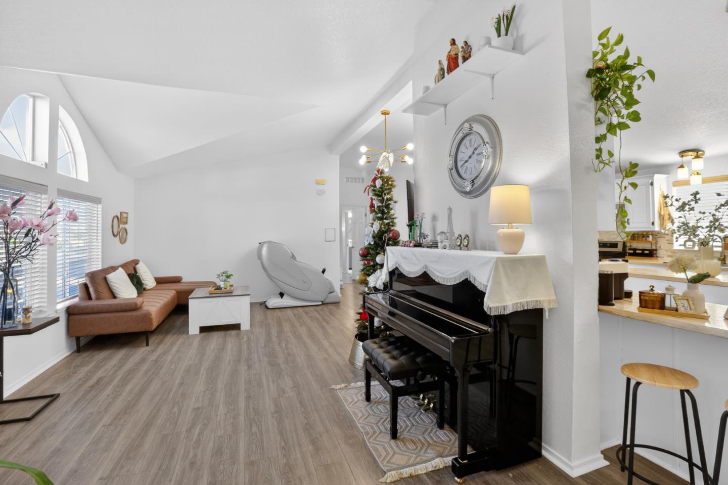120 Dixon Landing Road, Unit 9 Milpitas, CA 95035 - Photo 12 of 34 a living room with furniture and a clock