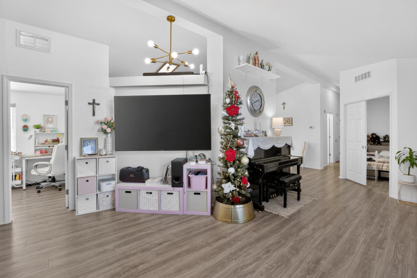 120 Dixon Landing Road, Unit 9 Milpitas, CA 95035 - Photo 13 of 34 a living room with furniture and a flat screen tv