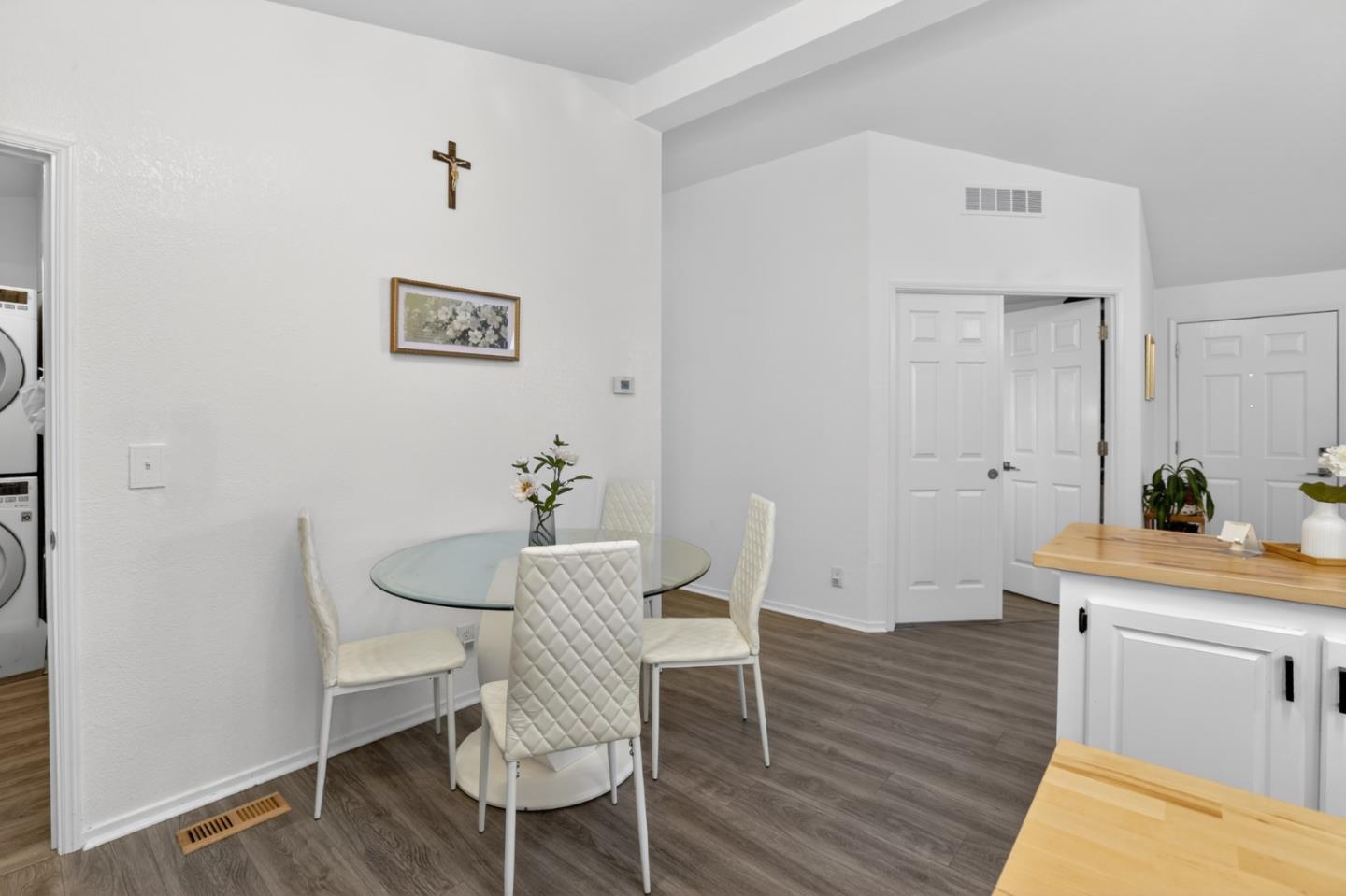 120 Dixon Landing Road, Unit 9 Milpitas, CA 95035 - Photo 21 of 34 a view of a dining room with furniture and wooden floor
