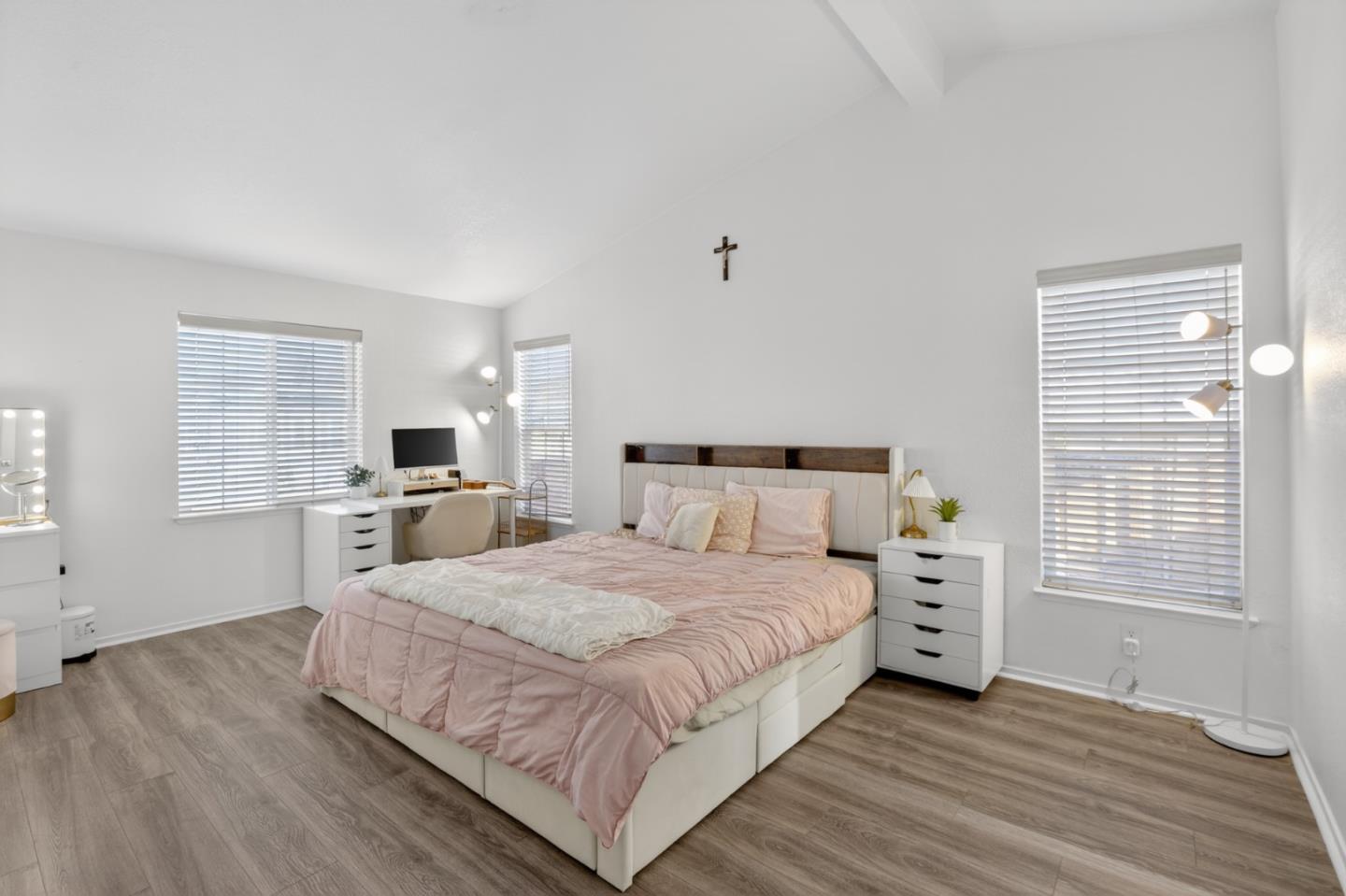 120 Dixon Landing Road, Unit 9 Milpitas, CA 95035 - Photo 23 of 34 a bedroom with a bed and a flat screen tv