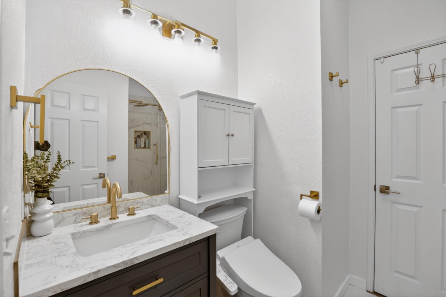 120 Dixon Landing Road, Unit 9 Milpitas, CA 95035 - Photo 30 of 34 a bathroom with a sink a toilet and shower