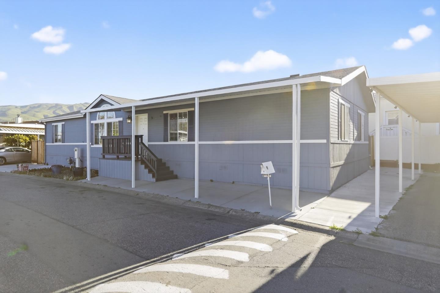 120 Dixon Landing Road, Unit 9 Milpitas, CA 95035 - Photo 3 of 34 a front view of a house with a yard