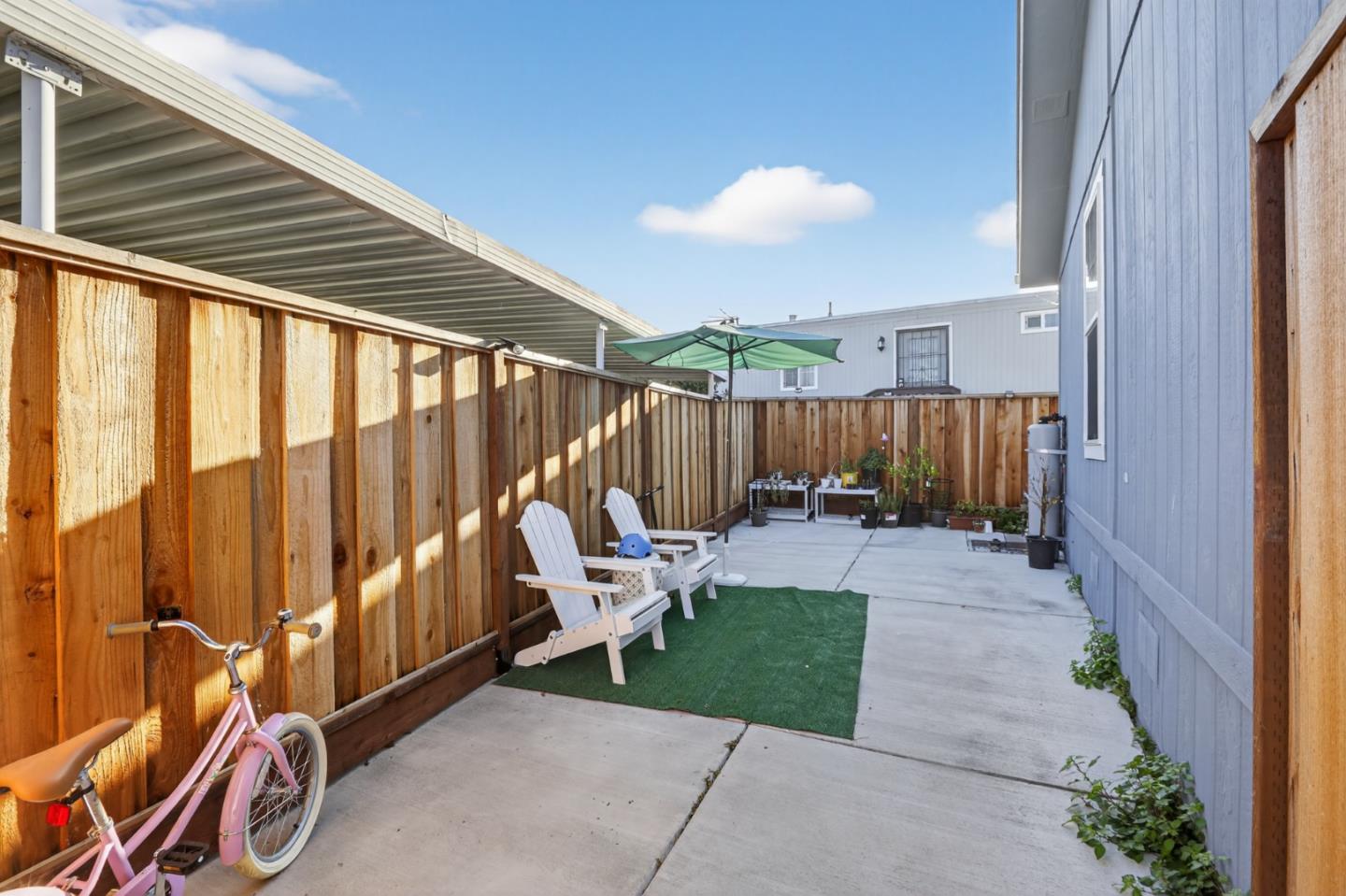 120 Dixon Landing Road, Unit 9 Milpitas, CA 95035 - Photo 5 of 34 a view of a patio with a table and chairs