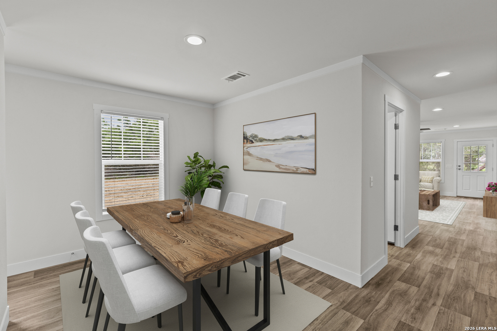 697 County Road 664 Devine, TX 78016 - Photo 7 of 19 a view of a dining room with furniture window and wooden floor