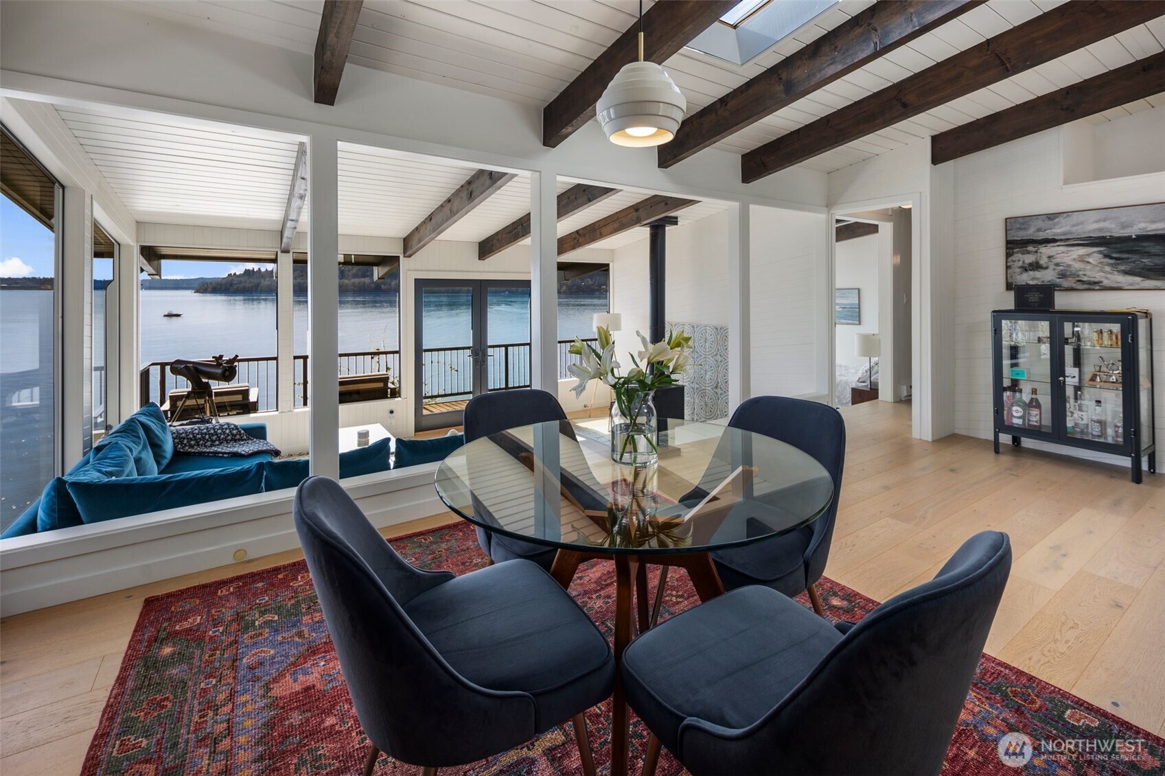 28605 Manzanita Beach Road Southwest Vashon, WA 98070 - Photo 11 of 39 a view of a dining room with furniture