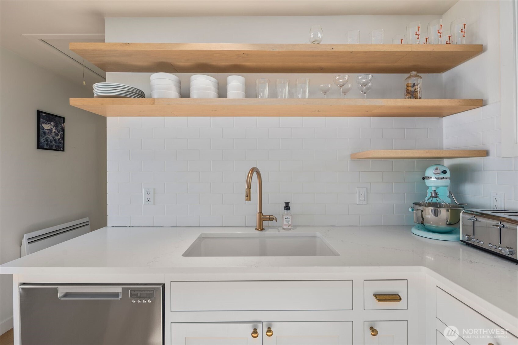 28605 Manzanita Beach Road Southwest Vashon, WA 98070 - Photo 15 of 39 a kitchen with a sink and cabinets