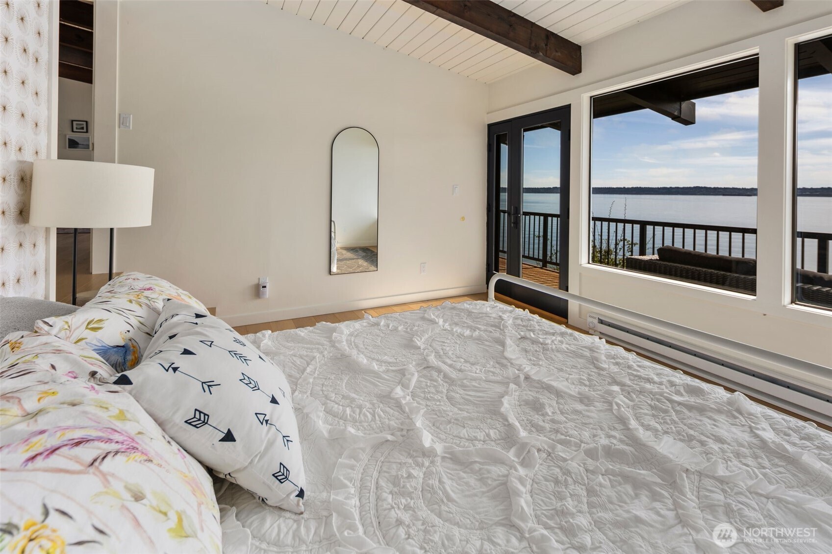 28605 Manzanita Beach Road Southwest Vashon, WA 98070 - Photo 17 of 39 a bedroom with a bed and a window