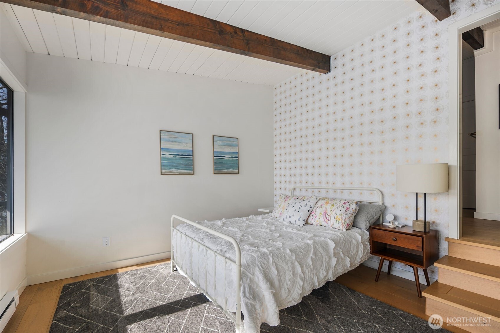 28605 Manzanita Beach Road Southwest Vashon, WA 98070 - Photo 18 of 39 a bedroom with a bed and a desk