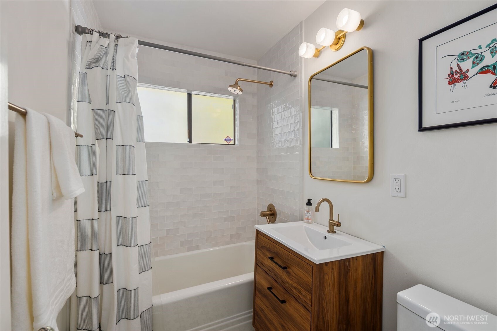 28605 Manzanita Beach Road Southwest Vashon, WA 98070 - Photo 25 of 39 a bathroom with a sink toilet tub and shower