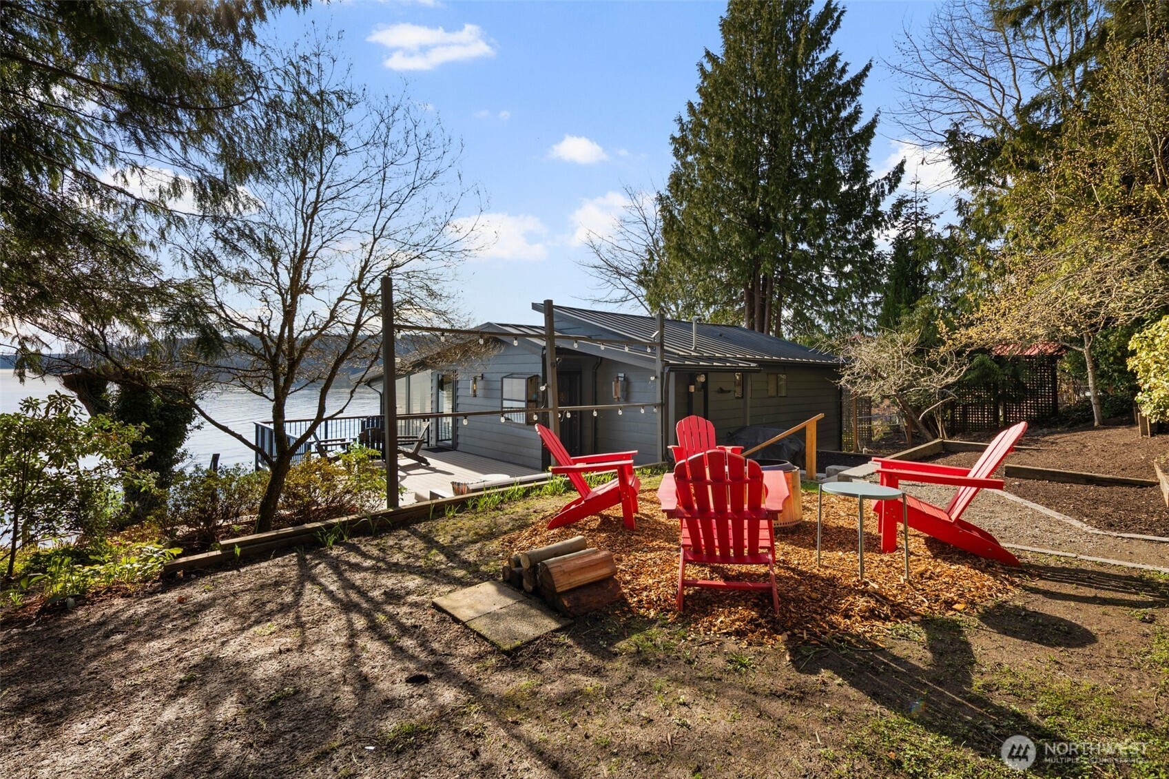 28605 Manzanita Beach Road Southwest Vashon, WA 98070 - Photo 33 of 39 a view of a house with backyard