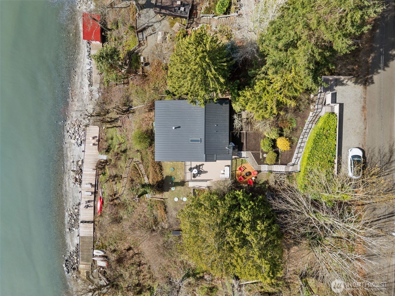 28605 Manzanita Beach Road Southwest Vashon, WA 98070 - Photo 36 of 39 view of a house with a yard and garden
