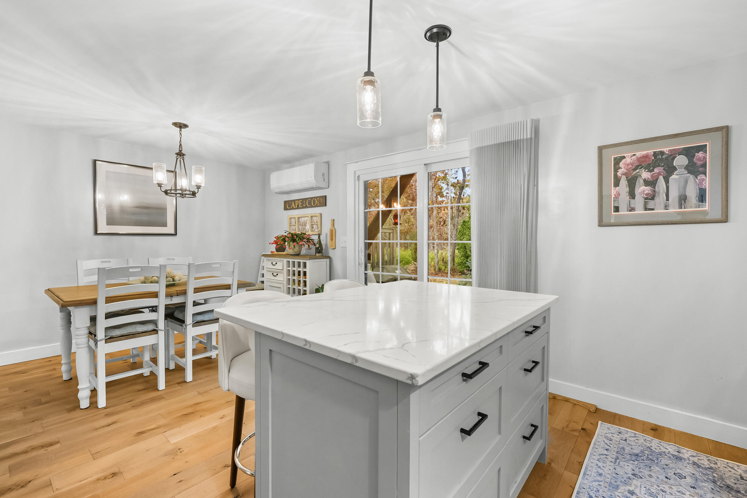 195 Falmouth Road, Unit 7B Mashpee, MA 02649 - Photo 15 of 38 a view of a dining room with furniture and window